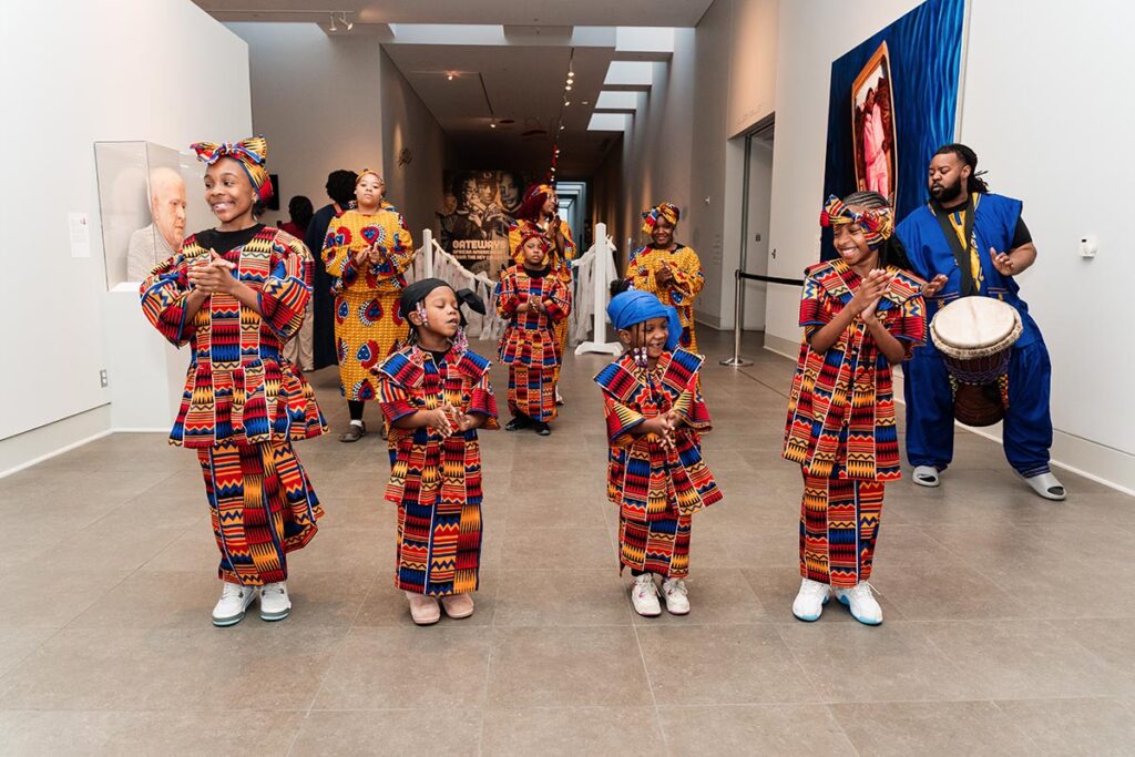 Performers dance at the Flint Institute of Arts during Dancing in the Streets: Thresholds in Flint, Michigan.