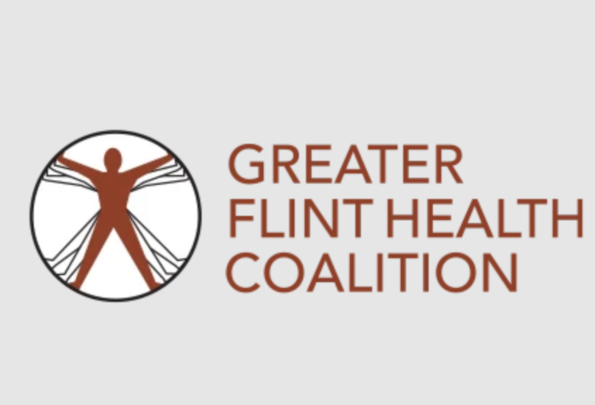 Greater Flint Health Coalition logo featuring a stylized human figure inside a circle.