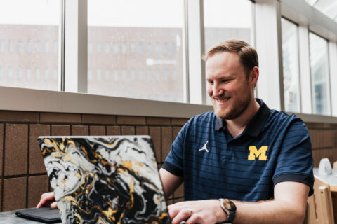 Zach Thomas, a student in the joint B.S./M.S. Software Engineering program with a concentration in artificial intelligence, poses for a portrait.