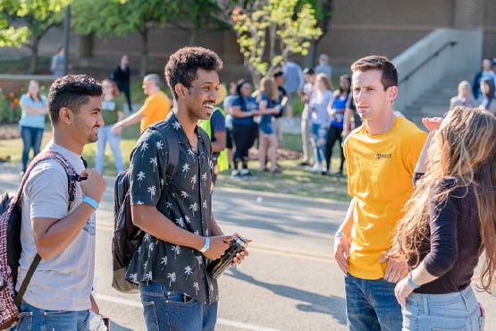 Group of students talking outside