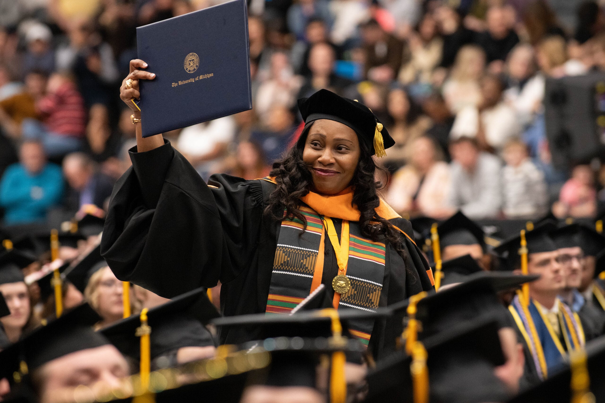 Students celebrate during the University of Michigan-Flint Winter Commencement ceremony at the Dort Financial Center in Flint, Michigan, on May 3, 2026.