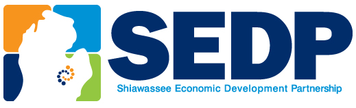 Logo of the Shiawassee Economic Development Partnership (SEDP) featuring a stylized map of Michigan and colorful squares.