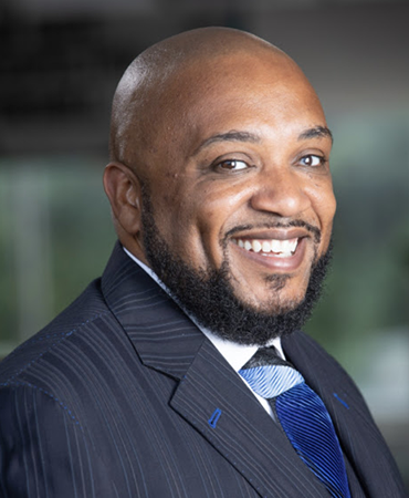 African American man in a dark suit