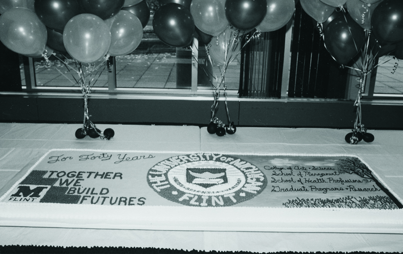 A large cake decorated for UM-Flint's 40th anniversary celebration.