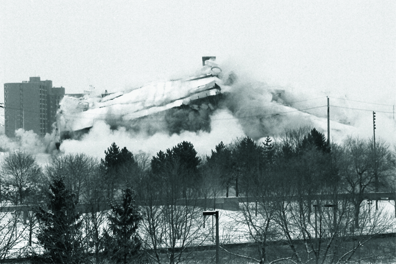 Smoke rising as the AutoWorld building is imploded.